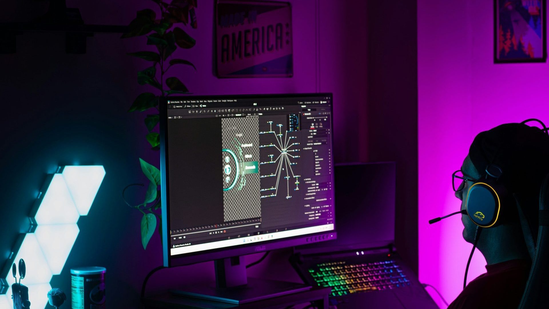 Person gaming with colorful rgb keyboard and monitor